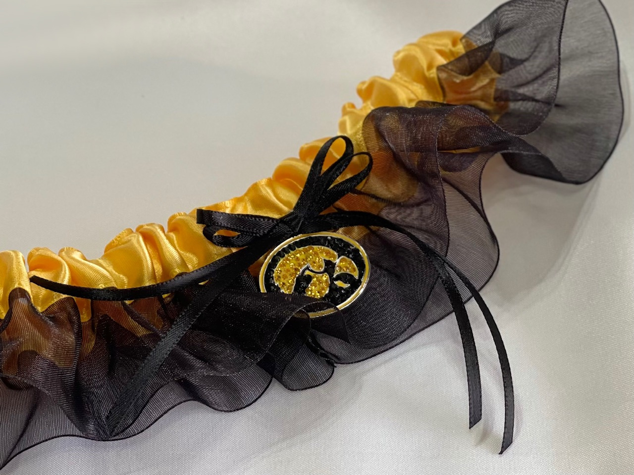 University of Iowa Inspired Garter with Licensed Collegiate Charm University of Iowa Inspired Garter with Licensed Collegiate Charm