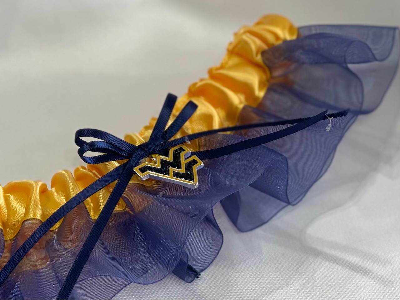 University of West Virginia Inspired Garter with Licensed Collegiate Charm