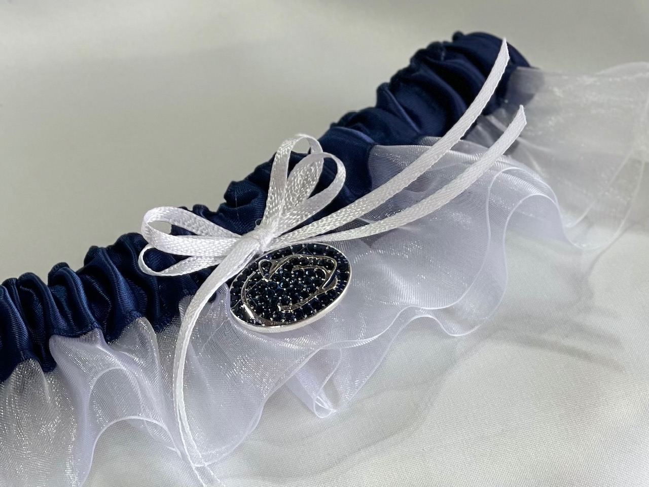 Pennsylvania State University Inspired Garter with Licensed Collegiate Charm