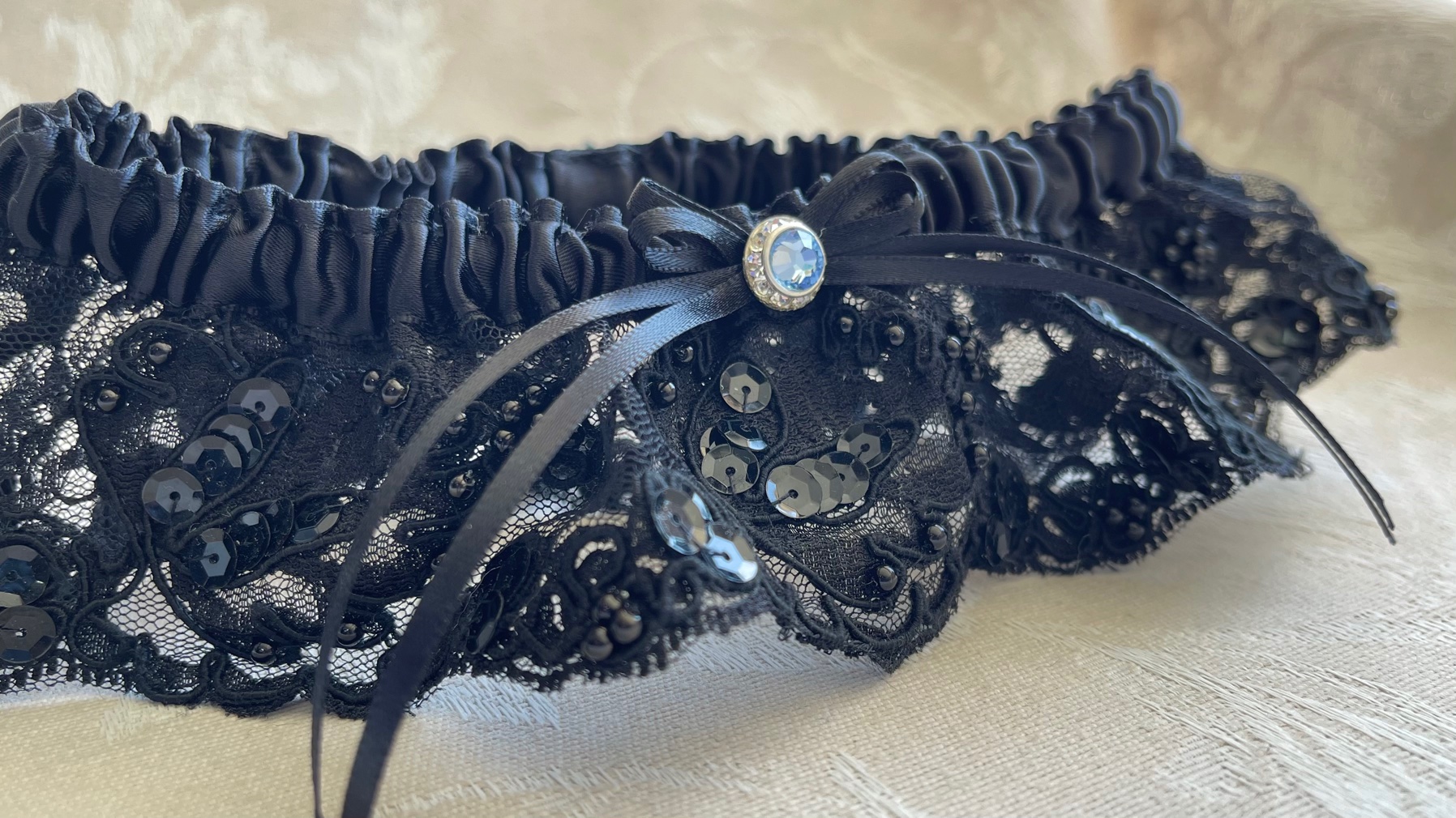Black re-embroidered beaded lace garter w/Blue crystal