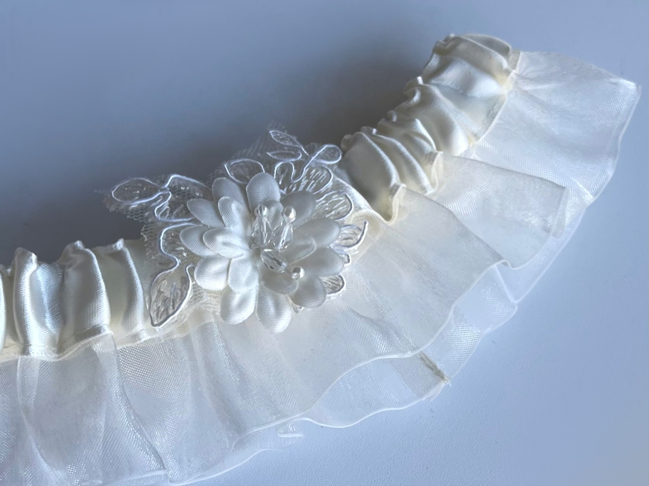 Ivory garter w/ Flower Accent