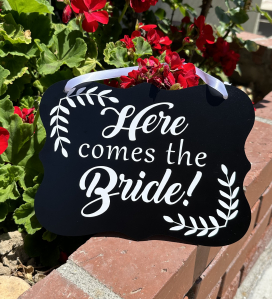 "Here comes the bride" sign
