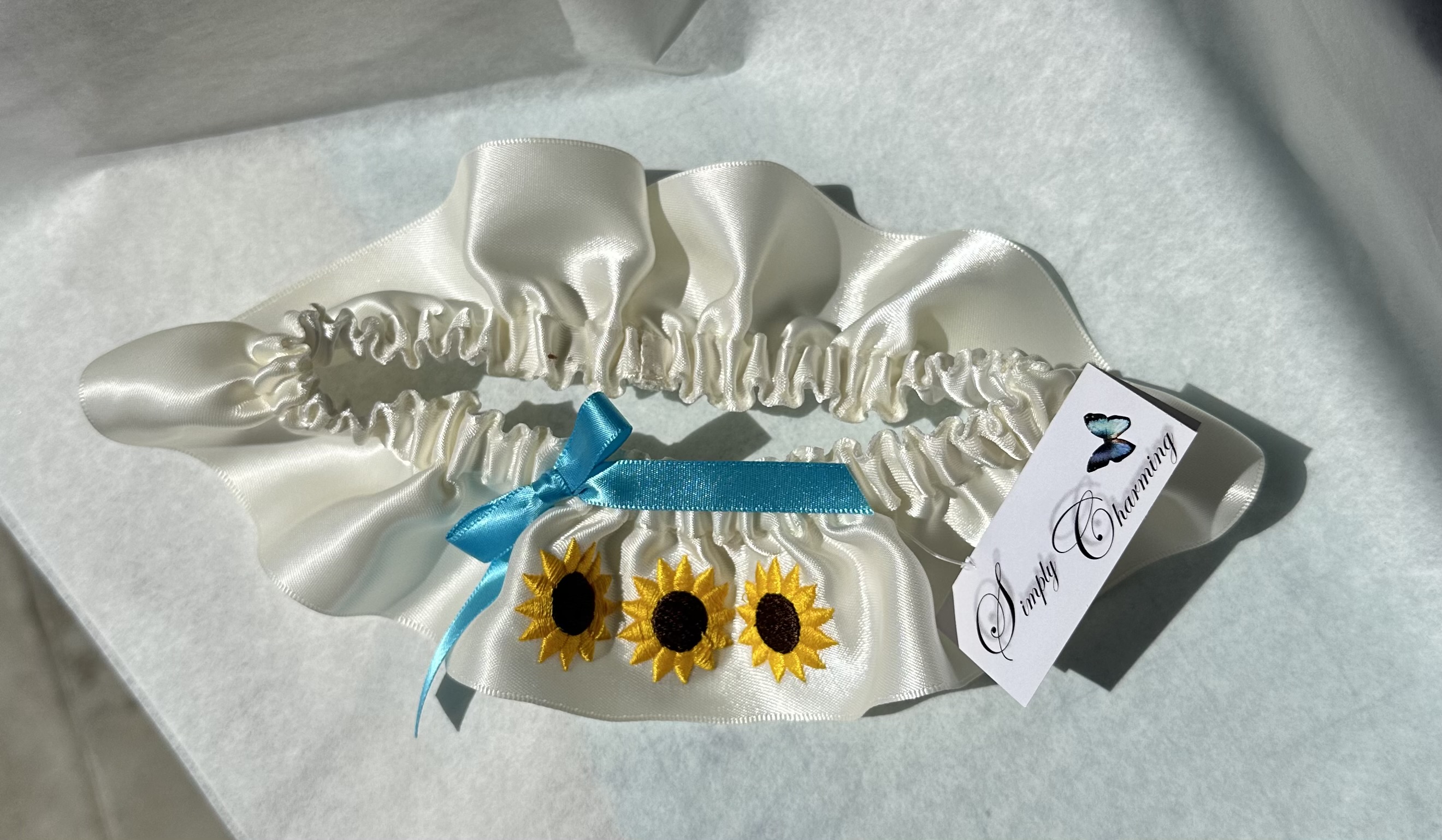 Sunflower Garter with turquoise bow