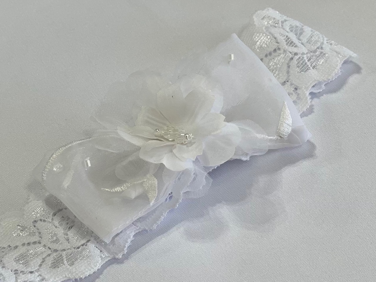 White stretch lace headband/silk flowers
