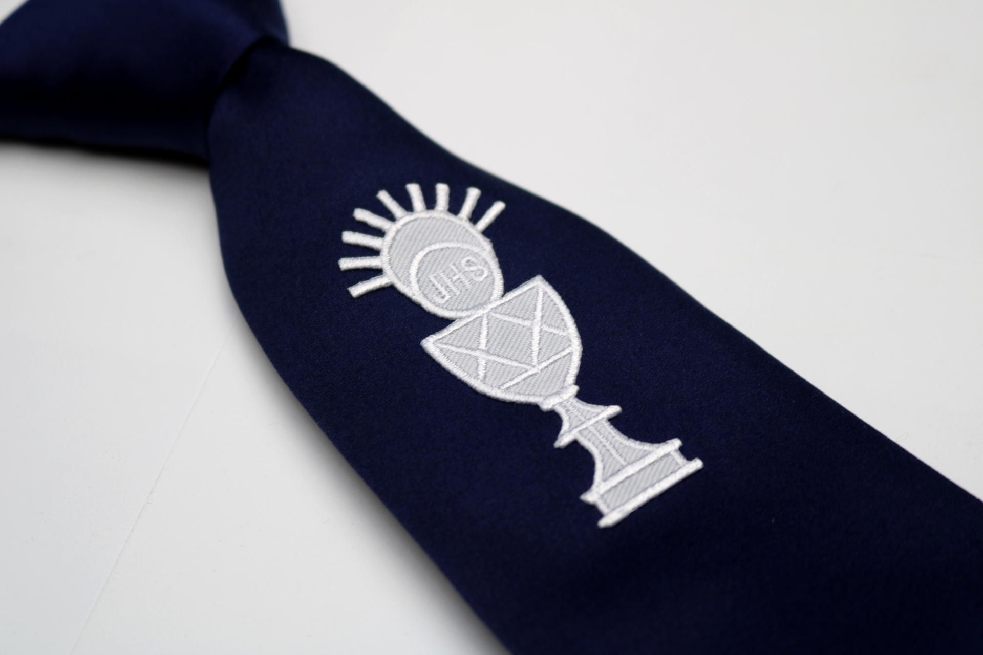 BOY'S NAVY TIE W/CHALICE