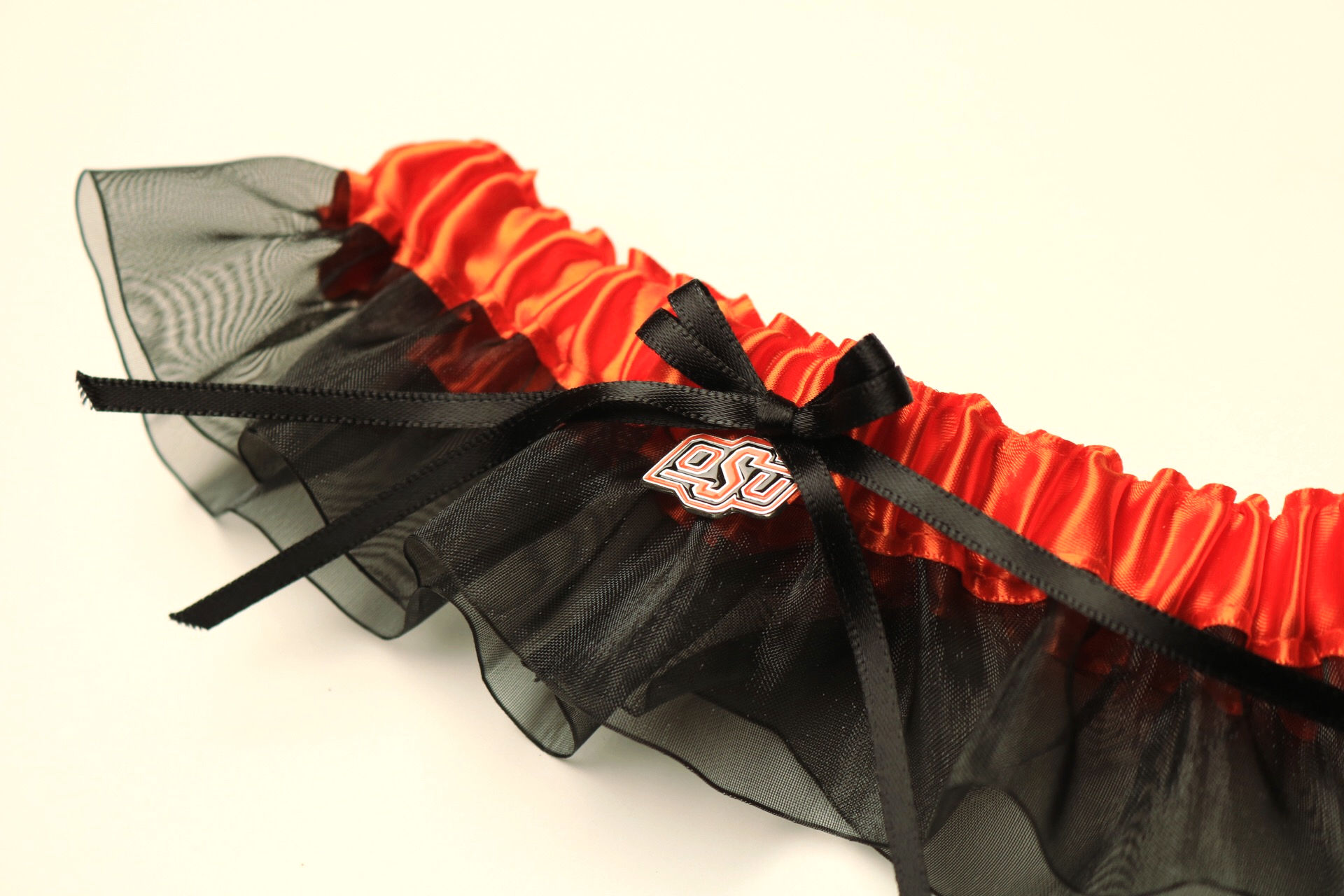 Oklahoma State University Inspired Garter with Licensed Collegiate Charm